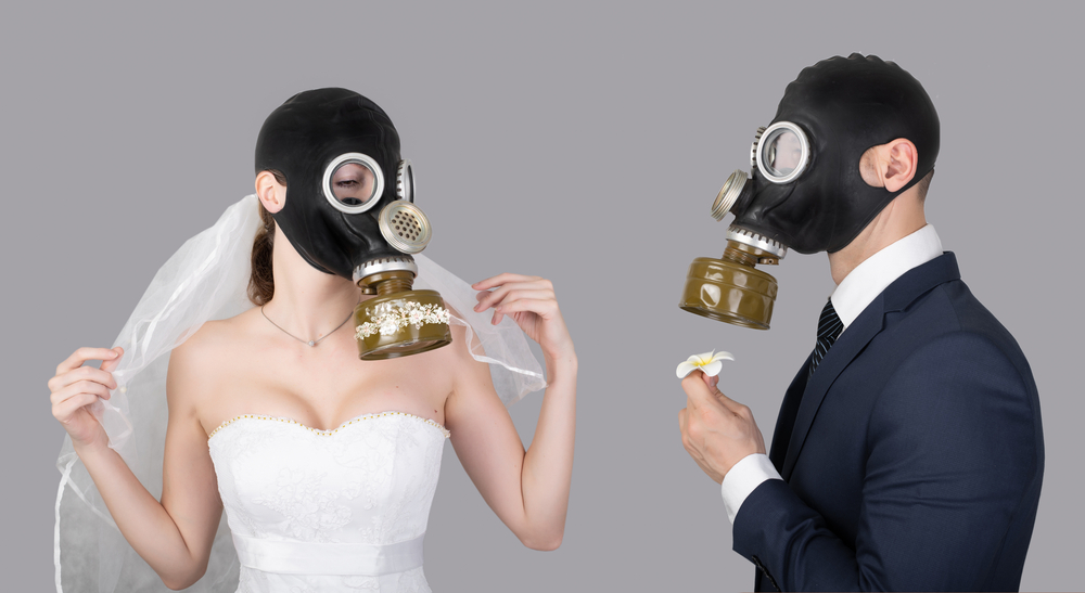 bride and groom in gas masks
