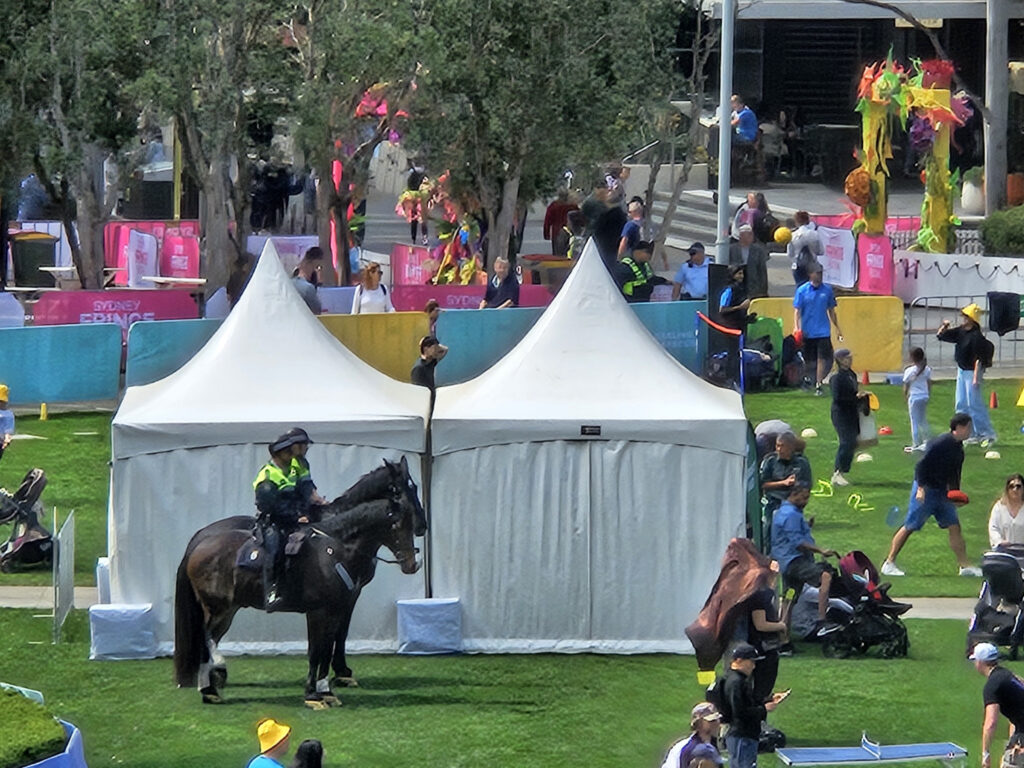 Pillingers large events and festival marquees stand proud behind two mounted officers. 